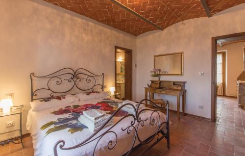 a bedroom with a large bed in a room at Villa Ghiandai in Arezzo