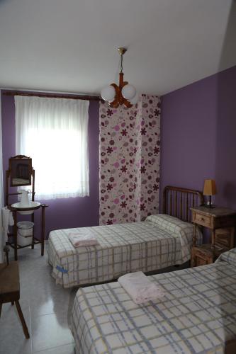 Postel nebo postele na pokoji v ubytování Rosancha