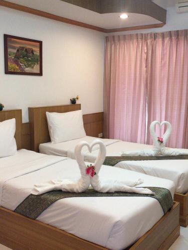 two beds with swans made to look like rabbits at Chaisiri Park View in Ban Nong Lup