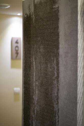 a close up of a metal wall in a room at Don Cesar Boutique Apartments in Benidorm