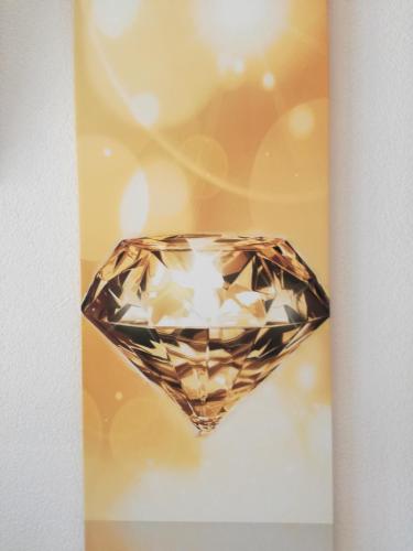 a close up of a yellow diamond at Apart Diamant in Nauders