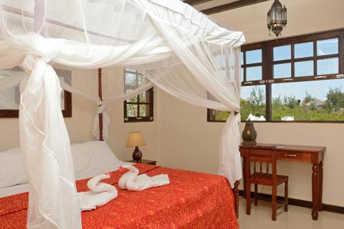 Postel nebo postele na pokoji v ubytování Villa Serenity, Tanzania Unforgettable