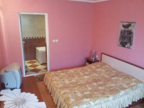 Ένα ή περισσότερα κρεβάτια σε δωμάτιο στο Hotel Triumph
