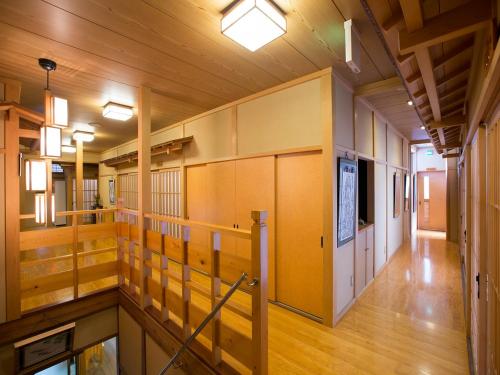 an inside view of a gymnasium with wooden walls and wood floors at Kanko Ryokan Kuboji in Tenkawa