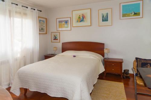 Ένα ή περισσότερα κρεβάτια σε δωμάτιο στο Casa da Magnólia