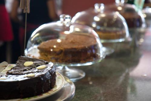 a chocolate cake on a plate on a table at Hotel Aitana in Irún