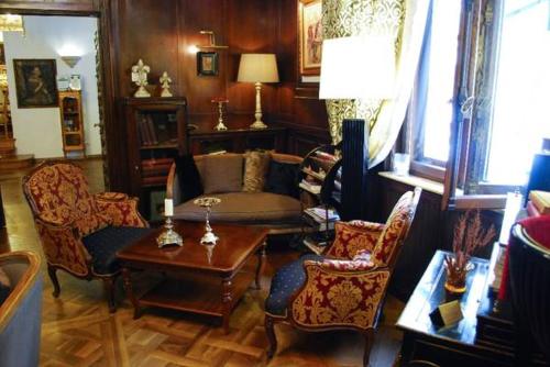 Posezení v ubytování Scala Boutique-Hotel