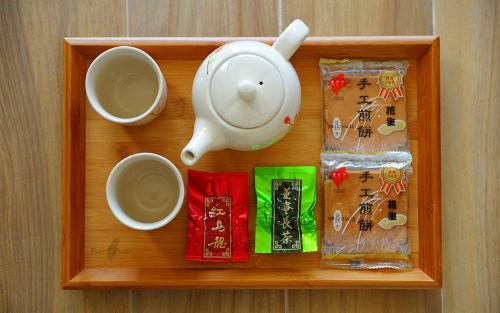 Принадлежности для чая и кофе в Yulaikung B&B
