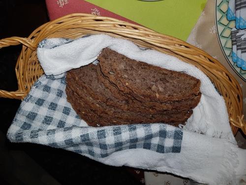 a piece of bread sitting in a basket at Landgasthof Trattnig in Schiefling am See