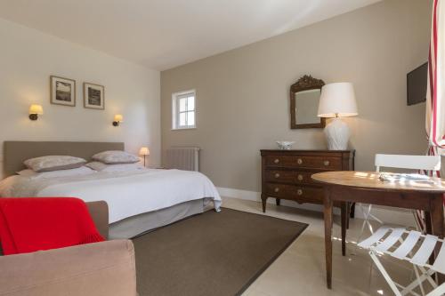 Un ou plusieurs lits dans un hébergement de l'établissement Chambre d'hotes de la Vallee