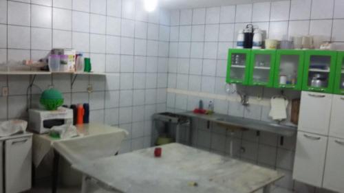 Kuchyň nebo kuchyňský kout v ubytování Hotel Italia