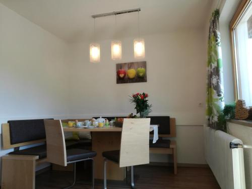 a dining room with a table and chairs at Apart Diamant in Nauders