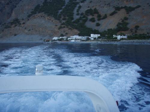 a view from the front of a boat in the water at Samaria in Agia Roumeli