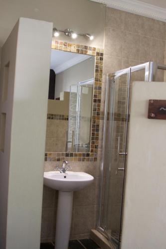Ванная комната в House Haven Guesthouse