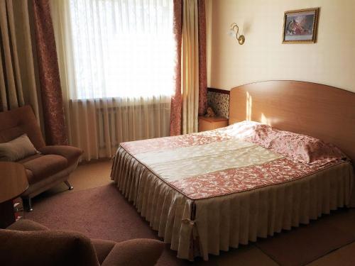 Cama o camas de una habitación en Vega Hotel