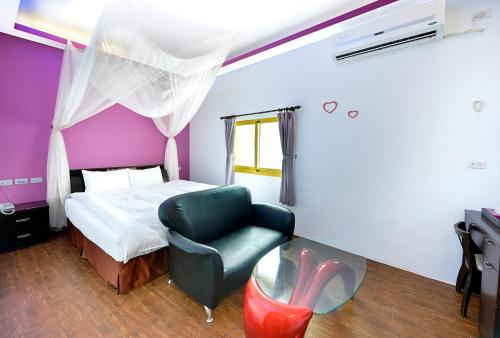 Postel nebo postele na pokoji v ubytování Star Inn 888