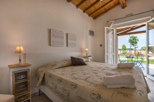 Säng eller sängar i ett rum på Agriturismo Pian di Spille - Golf