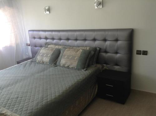 Postel nebo postele na pokoji v ubytování Cosy Appartement Rabat Haut Agdal