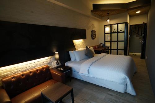 Postel nebo postele na pokoji v ubytování Kenting Moon Bay Hotel