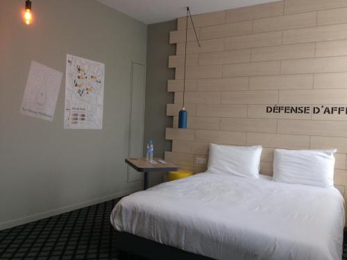 Кровать или кровати в номере ibis Styles Chalons en Champagne Centre