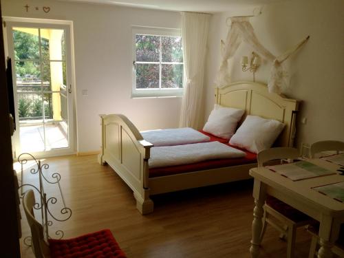 En eller flere senge i et værelse på PETITE FRANCE Apartment - EP Ticket Garantie