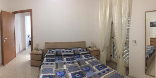 Posteľ alebo postele v izbe v ubytovaní Casa Vacanze il Gelsomino