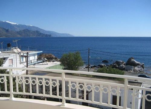 a view of the ocean from a balcony at Yiorgos Studios in Palaiochora