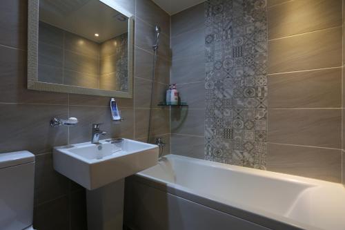 Kylpyhuone majoituspaikassa Paradaise Motel