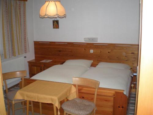 Säng eller sängar i ett rum på Alpenhof "alt Lähn"