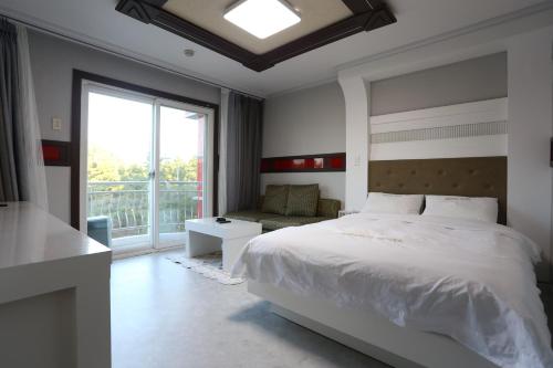 Кровать или кровати в номере Paradaise Motel