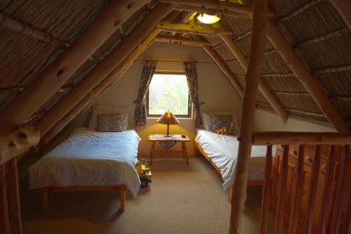 Una cama o camas en una habitación de Easy Five Guest House