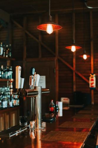 a bar with a counter top with a bar istg at Chebeague Island Inn in Royal Junction
