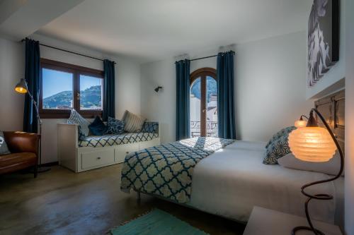Posteľ alebo postele v izbe v ubytovaní Boutique Hotel La Posada del Angel Ojén