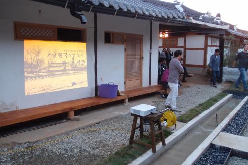 a group of people standing outside of a building at Sarangroo in Jeonju