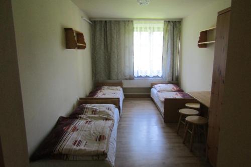 Postel nebo postele na pokoji v ubytování Mylak BIANCA