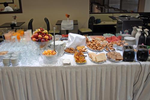 a table with a buffet of food on it at Gran Hotel Continental in Mar del Plata