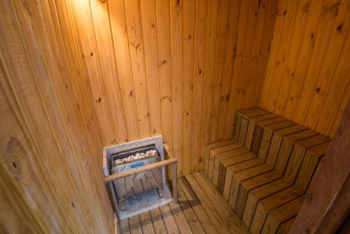 an inside view of a wooden sauna at Ilha de Toque Toque Eco Hotel in São Sebastião