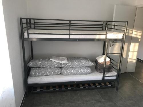 a couple of bunk beds in a room at Victoria Appartement in Kappel-Grafenhausen