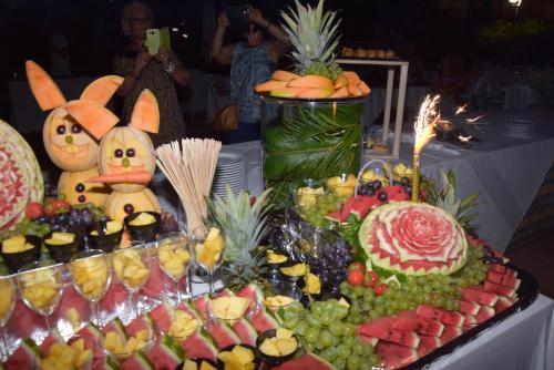 a buffet of fruit and vegetables on a table at Perticari in Pesaro