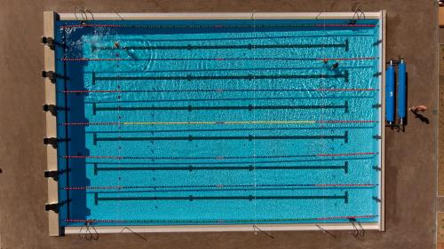 an overhead view of a blue swimming pool at Restart in Rēzekne