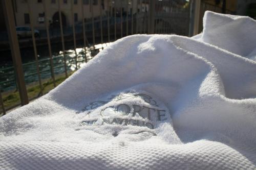 a snow sculpture of a face in a blanket at La Corte sul Naviglio in Boffalora sopra Ticino