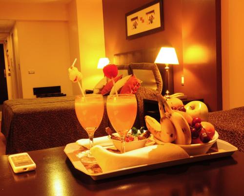 a tray of fruit and drinks on a table in a hotel room at Gran Hotel Continental in Mar del Plata