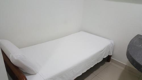 Postel nebo postele na pokoji v ubytování Hotel Paka INN