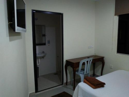 Postel nebo postele na pokoji v ubytování Hotel Paka INN