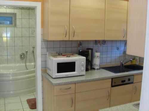 Kuchyň nebo kuchyňský kout v ubytování Ferienwohnung Mörlenbach
