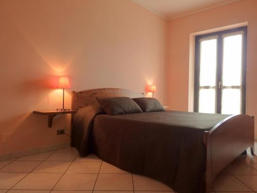 Postel nebo postele na pokoji v ubytování Agriturismo L'Ciabot