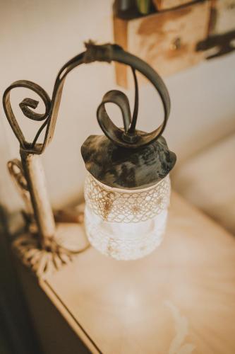 a metal container sitting on top of a table at Masseria Montenapoleone in Fasano