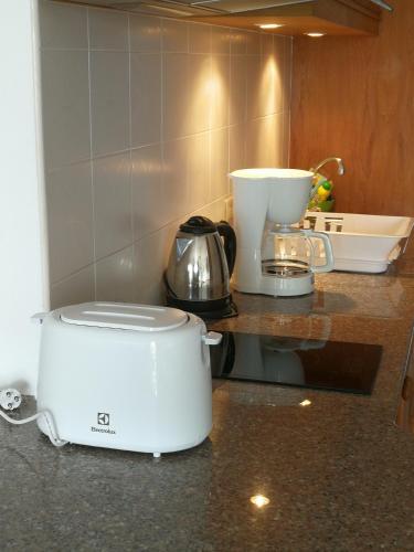 a kitchen counter with a toaster and a blender at Studio View Talay 5C in Pattaya South