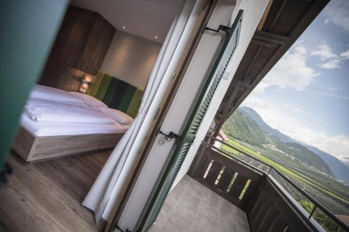 Postel nebo postele na pokoji v ubytování Hotel Garni Andrianerhof