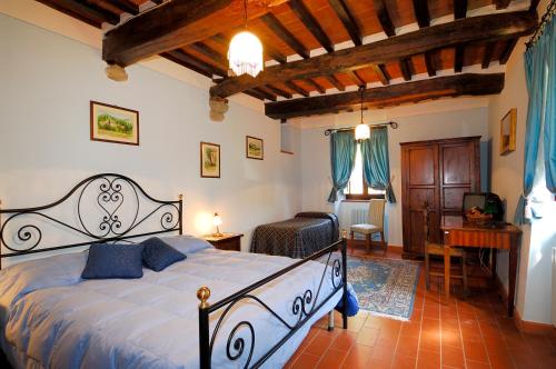 Katil atau katil-katil dalam bilik di La Casa Colonica